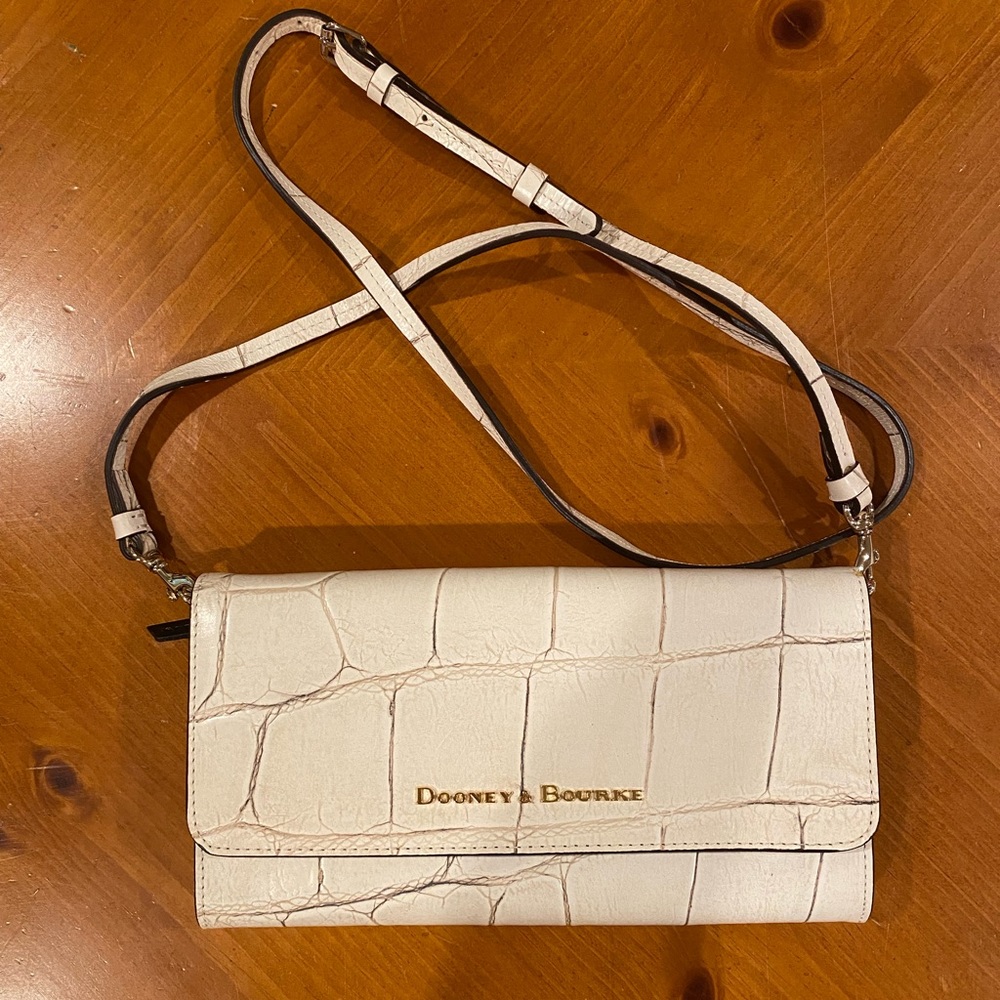 Dooney and Bourke cream clutch with removable Crossbody strap